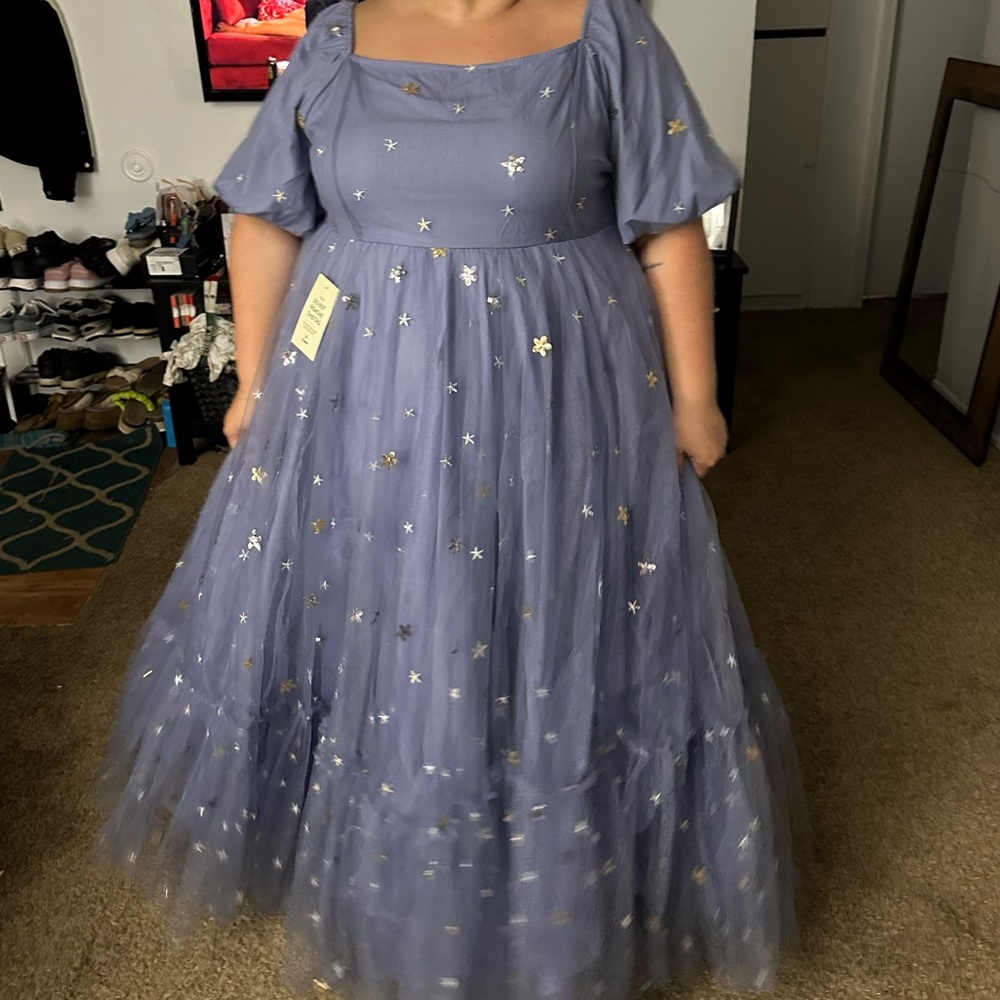 Light blue dress with gold and silver starts